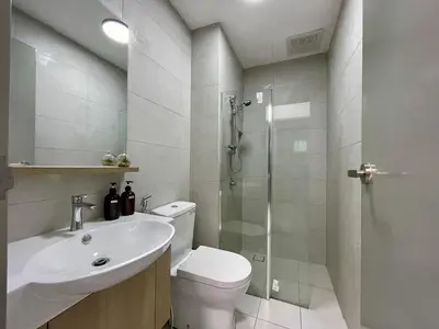 a bathroom with a toilet and a sink and a shower at NEW Bt Kawan8 3BR Suite-IKEA-UOW-KDU-ColumbiaAsia in Simpang Ampat