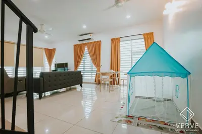a living room with a fish tank in a room at Ipoh Gateway by Verve 4R4B - 14 Pax in Ipoh