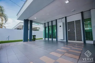 a large building with green shutters on it at Ipoh Gateway by Verve 4R4B - 14 Pax in Ipoh