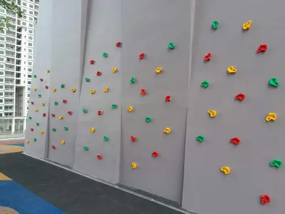 a wall with climbing equipment on a wall at Urban Suites Jelutong Georgetown Penang 6pax 3BR Family Cozy Homestay in George Town