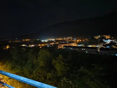 a view of a city at night at Unisuites Kampar Studio UTAR TARC -3pax, Pet Friendly, FREE 1 Carpark & Netflix in Kampar