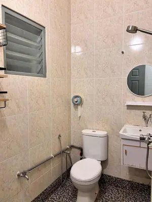 a bathroom with a toilet and a sink at CornerDouble-Storey&KTV Snooker 16Pax Ipoh By MICASA GROUP in Ipoh