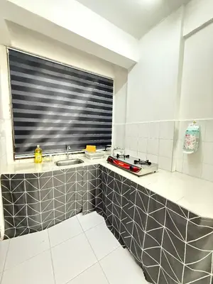 a kitchen with a sink and a window at SZ Homestay Near KPJ Hospital in Kampong Permatang Batu