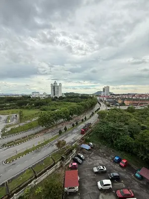 an aerial view of a parking lot with cars at SZ Homestay Near KPJ Hospital in Kampong Permatang Batu