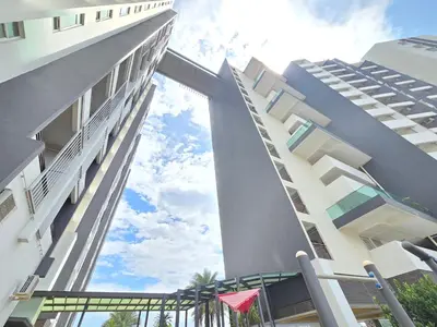 a view of two tall buildings from the street at The Majestic Privilege Suites - Ipoh in Ipoh