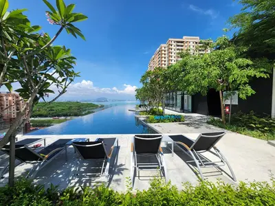 a view of a river with chairs and buildings at Urban Suite the Privilege Suites by Merveille in George Town