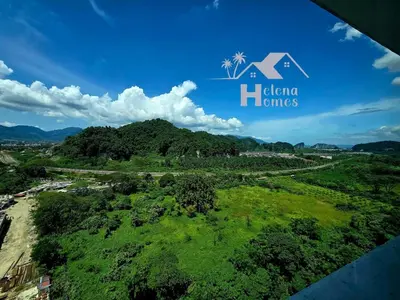 an aerial view of a green field with a mountain at b09 The Anderson Ipoh Family Stay 2BR in Ipoh