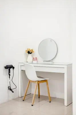 a white desk with a mirror and a white chair at i Homes Villa 3 Nearby Sunway - Swimming Pool and Karaoke in Ipoh