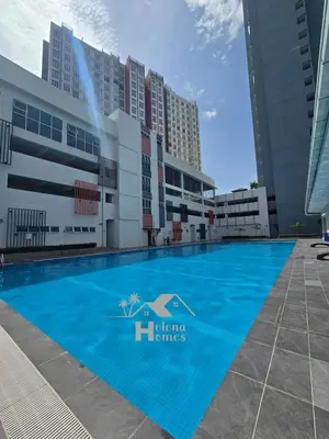 a swimming pool in front of a building at b07 The Anderson Ipoh Family Stay 2BR in Ipoh