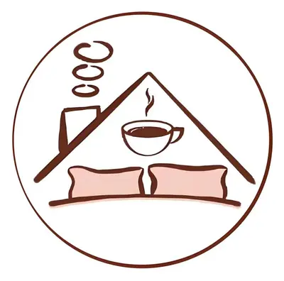 a sign with a cup of coffee and pillows at TY Youth Hostel in Sekincan