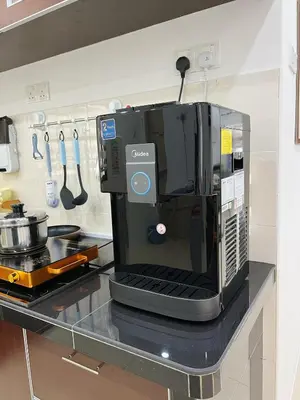 a coffee maker sitting on a counter in a kitchen at BM Alma Aeonjusco Auto City Homestay in Bukit Mertajam