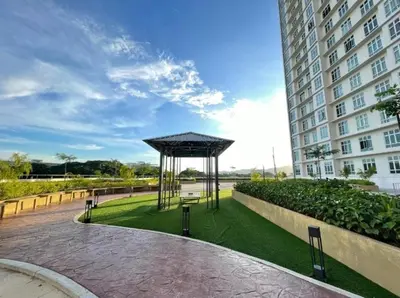 a pavilion in a park next to a building at c02 The Anderson Ipoh Family Stay 2BR in Ipoh