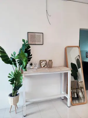 a white desk with a potted plant and a mirror at Cameron Highland 915 Glamping Style 3BR 10 Pax in Brinchang