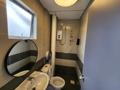 a bathroom with a sink and a toilet and a mirror at Cameron Highland 915 Glamping Style 3BR 10 Pax in Brinchang