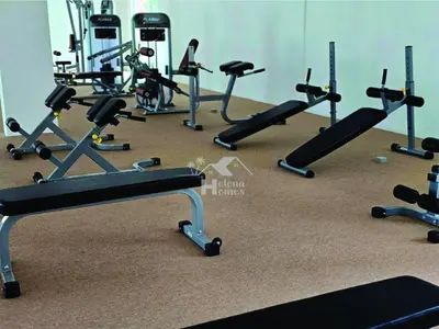 a gym with several tread machines in a room at a06 The Anderson Ipoh Family Stay 2BR in Ipoh
