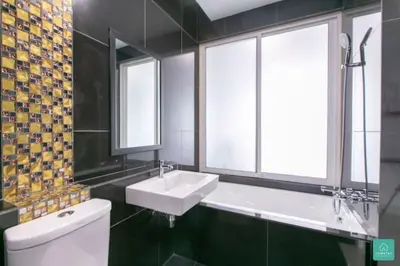 a bathroom with a sink and a toilet and two windows at Jomstay Octagon Ipoh Penthouse in Ipoh