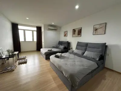 a large living room with a bed and a couch at Wonderful Seaview Studio 4Pax 118 Island Plaza in George Town