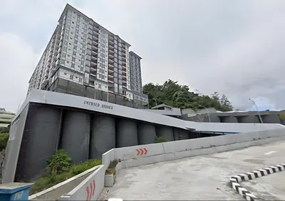 a tall building with a sign on the side of it at Cameron Highland 623 London style 10pax in Brinchang