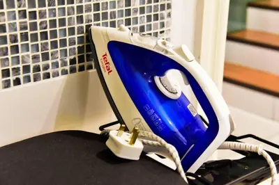 a telephone sitting on top of a desk at Botani Pool Villa 5R4B 14pax Karaoke BBq in Ipoh