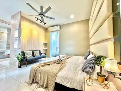 a bedroom with a bed and a ceiling fan at Botani Pool Villa 5R4B 14pax Karaoke BBq in Ipoh