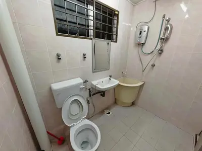 a bathroom with a toilet and a sink at Be Stay Ipoh with parking - 14pax, 5Rooms in Ipoh