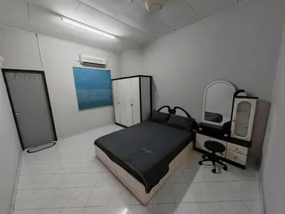 a hospital room with a bed and a desk at Be Stay Ipoh with parking - 14pax, 5Rooms in Ipoh