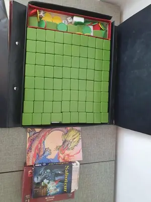 two games are sitting next to each other at The Octagon -The City Centre Signature Suite in Ipoh in Ipoh