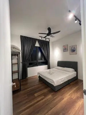 a bedroom with a bed and a ceiling fan at Sunway Onsen beautiful view 4-6pax in Tambun
