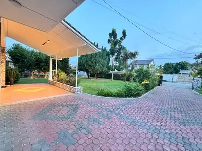 a brick driveway in front of a house at Greentown Villa - Ipoh City Centre near Ipoh Parade by IWH Suites in Ipoh