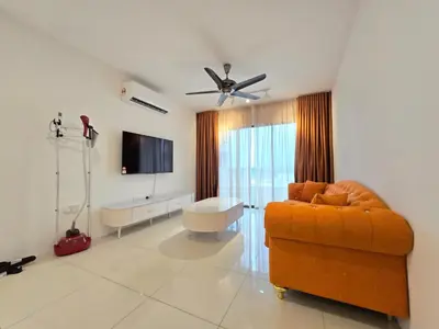 a living room with a couch and a flat screen tv at Manhattan Condo - Ipoh Merveille Luxe Stay in Ipoh