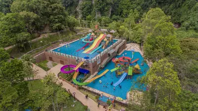 an aerial view of a water park with slides at EcoPutra Stay in Ipoh