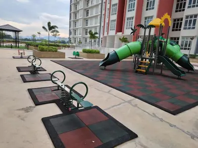 a playground with a slide in a building at CK Homestay in Ipoh