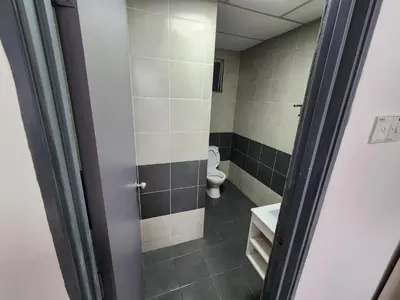 a small bathroom with a toilet and a sink at Sweet Home G12 Emerald Avenue in Brinchang