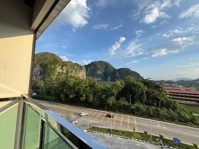 a balcony with a view of a parking lot at D'Royale NH Homestay Kompleks Mutiara Gua Musang in Gua Musang