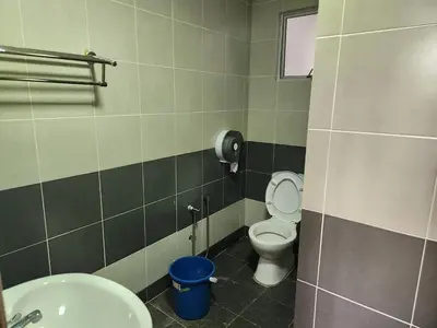 a bathroom with a toilet and a sink at 8-28 The Art Gallery Emeral Avenue in Brinchang