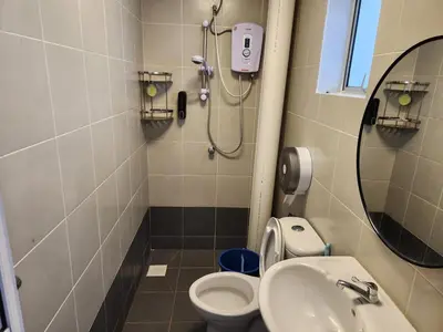 a bathroom with a shower and a toilet and a sink at 8-28 The Art Gallery Emeral Avenue in Brinchang