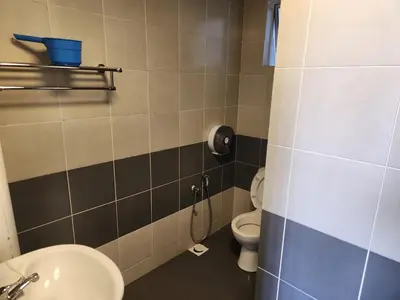 a bathroom with a sink and a toilet at 821 Camping Style in Brinchang