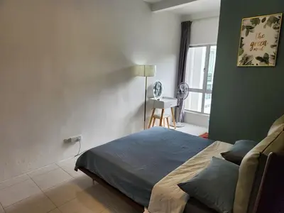 a bedroom with a bed and a window and a desk at 821 Camping Style in Brinchang