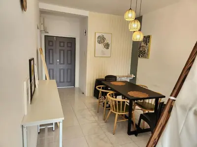 a dining room with a table and chairs at 821 Camping Style in Brinchang