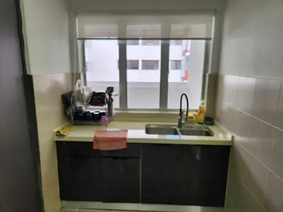 a small kitchen with a sink and a window at 821 Camping Style in Brinchang