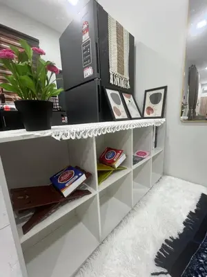 a room with white shelves with products on them at Nahyra Homestay, Múslīm Only, WIFI, Netflix, 4 Bilik in Sungai Petani