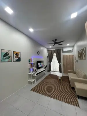 a living room with a couch and a ceiling fan at Nahyra Homestay, Múslīm Only, WIFI, Netflix, 4 Bilik in Sungai Petani