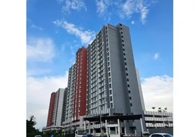 a tall red and white building with a sky at Ipoh Anderson Condo - 2BR in Ipoh