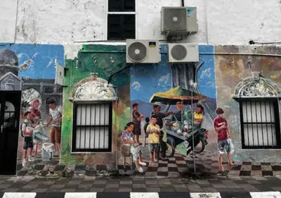 a mural of a group of people on a wall at Ipoh Anderson Condo - 2BR in Ipoh