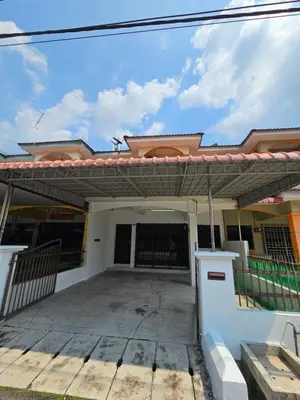 a house with a patio in front of it at Pera House Hostel in Ipoh