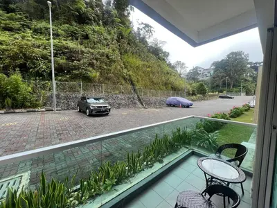 a balcony with a view of a parking lot at StayIndah Homestay Cameron Highlands in Tanah Rata