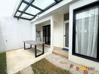 a table sitting on the patio of a house at SS2 Landed in Petaling Jaya for 8 Pax in Gua Sai