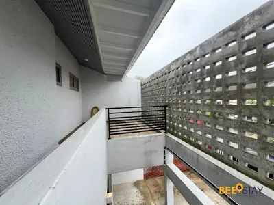 a hallway of a building with a stair case at SS2 Landed in Petaling Jaya for 8 Pax in Gua Sai