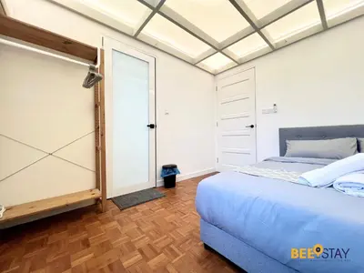 a bedroom with a bed and a skylight at SS2 Landed in Petaling Jaya for 8 Pax in Gua Sai