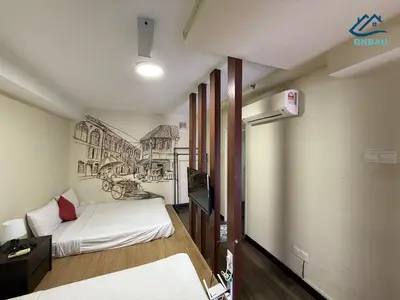 a bedroom with a bed and a drawing on the wall at Duplex Comfort Stay in George Town in George Town